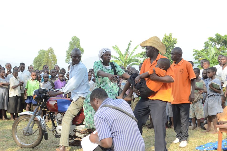 pDrama groups provide another innovative platform to spread health messages among communities In this photo a community in Mbale Uganda watches a performance that shows what to do when someone falls sick from malariap