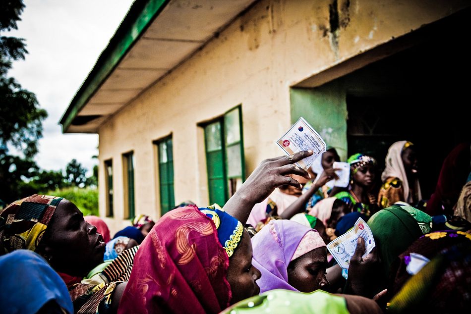 pspanA crowd of women wait outside the LLIN collection point with their vouchers in hand Across Nigeria SuNMaP has procured and distributed approximately two million LLINs as part of its contribution to the national LLIN campaignsspanp