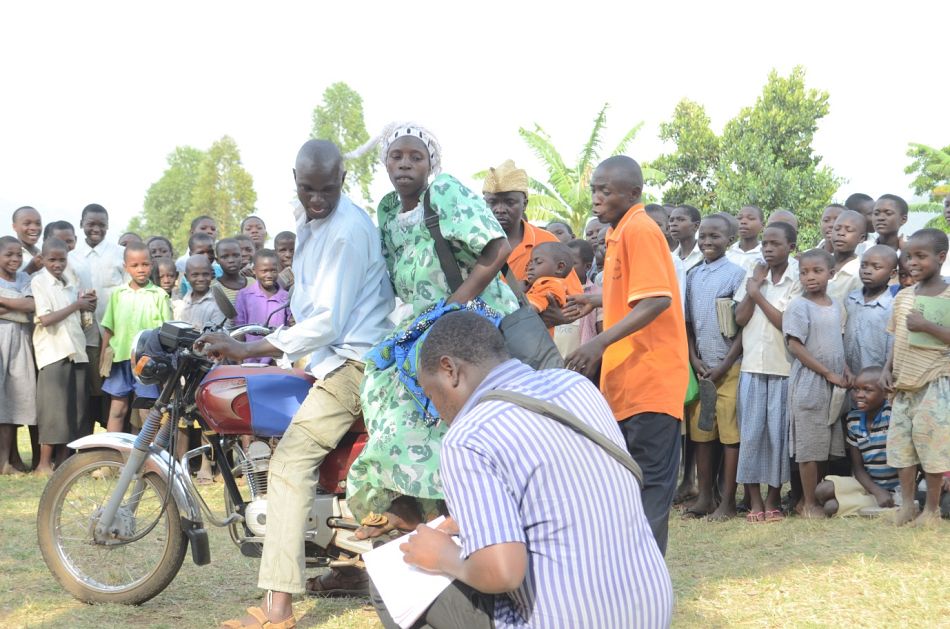 pMugoya shows how to pay for a boda boda driver by completing a payment coupon to be cashed in at the hospitalnbspp