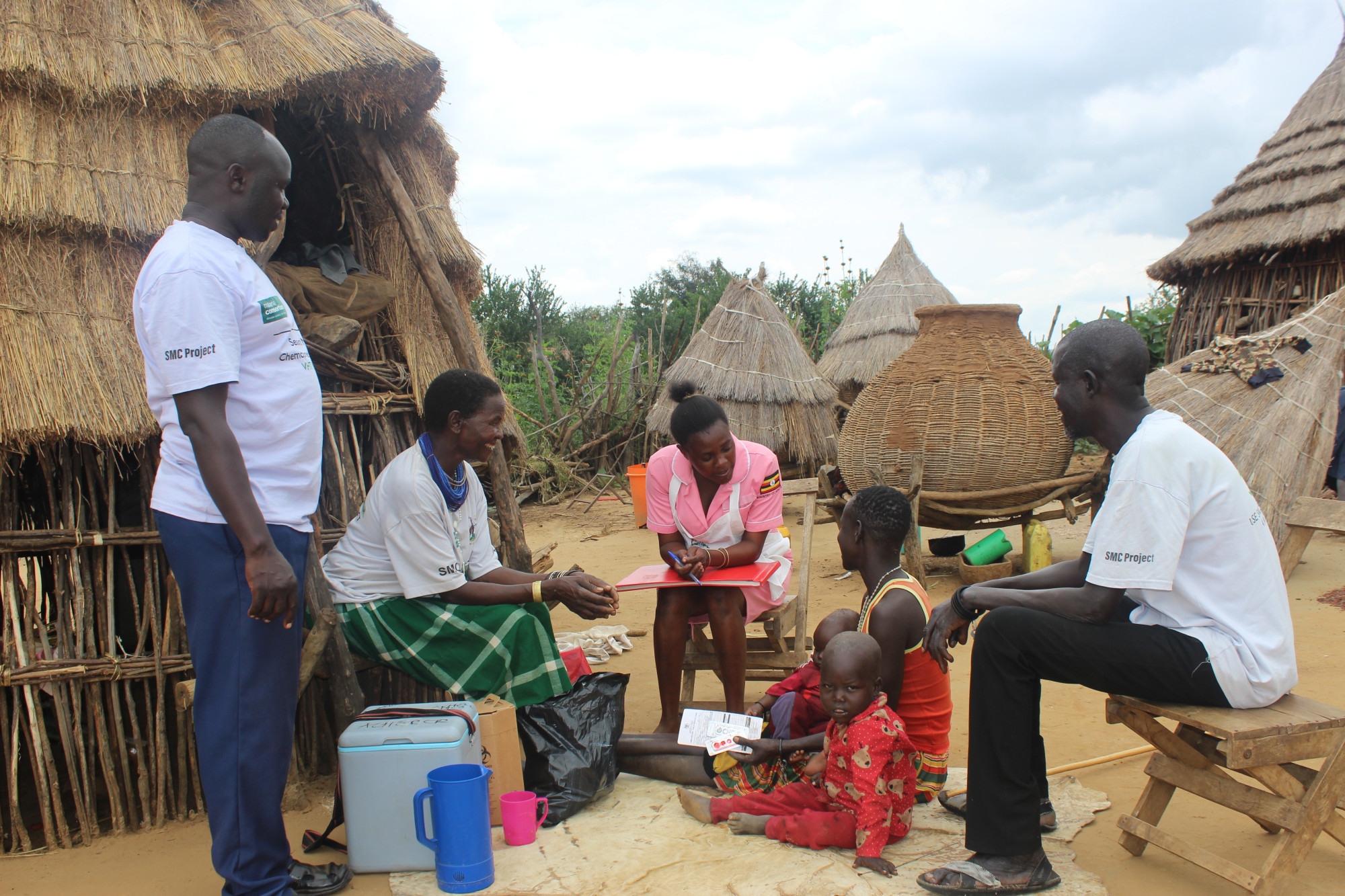 Frontline workers engage caregivers in a home-based consultation, combining service delivery with education to strengthen understanding, trustand sustained malaria prevention practices.