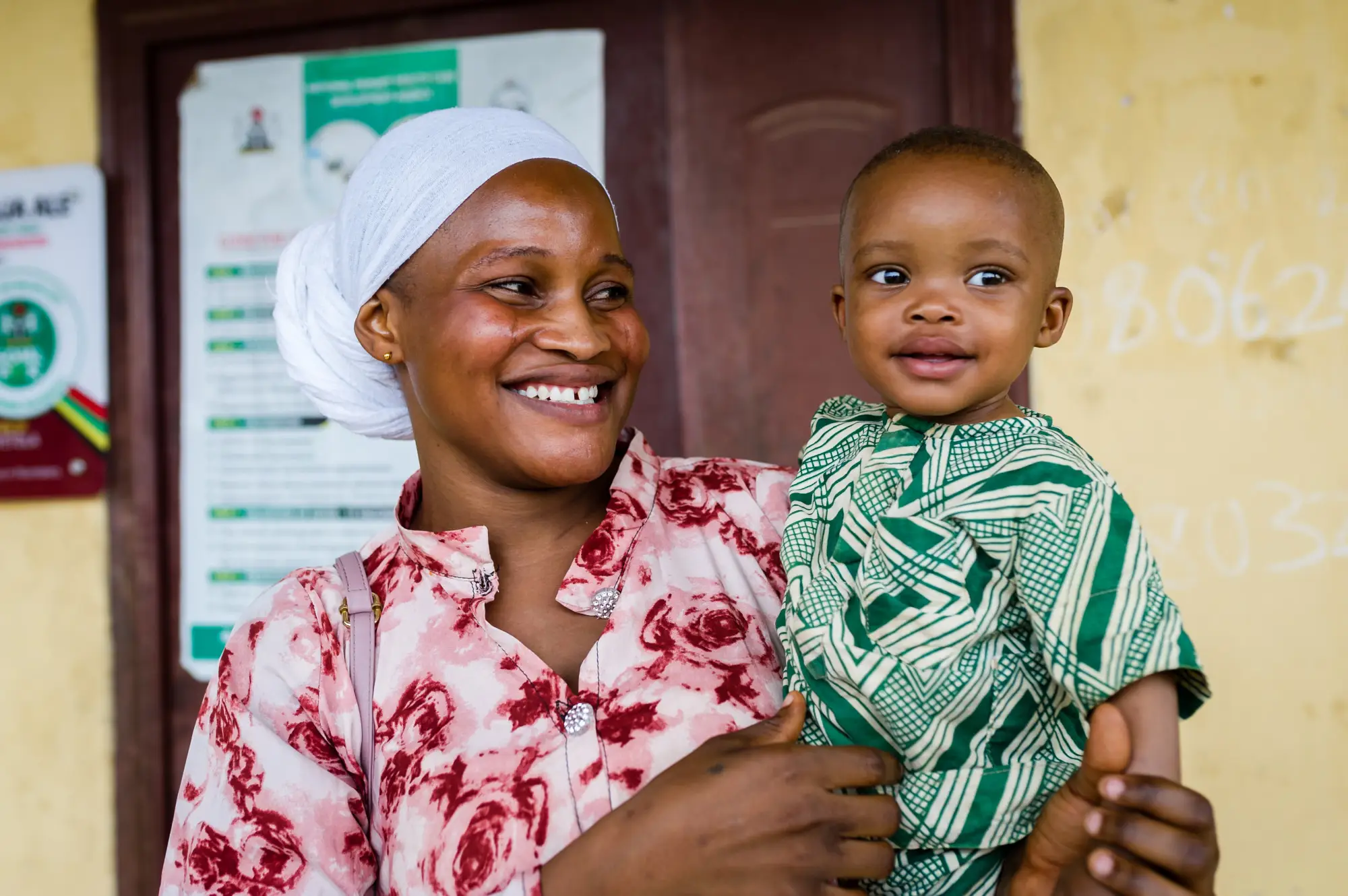Ogunbunmi Sakirat and her 14 months old child Ogunbunmi Fausat, after receiving counselling and vaccination, during PMC vaccination exercise at Ijegbe PHC, Ayedaade LGA, in Osun State, Nigeria, on September 8, 2023. PMC helps to prevent malaria in children under five via a delivery of antimalarials according to routine vaccination schedules (EPI): usually at 10 weeks, 14 weeks and nine months of age. Photo by Light Oriye