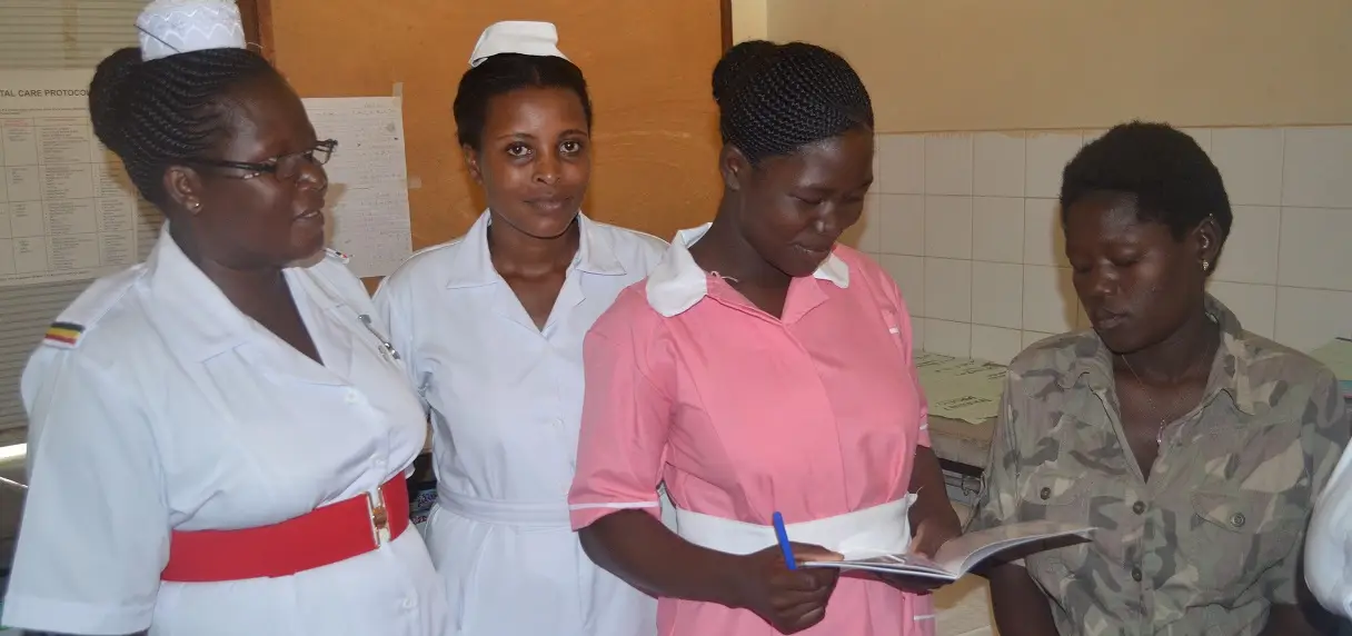 Moyo Hospital, West Nile region - patient Riziki Halima with nurses after receiving IPTp