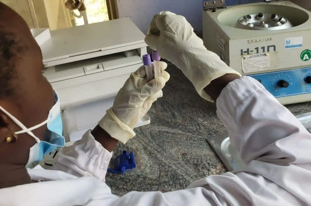 Centrifuging blood samples at Soroti regional referral hospital, Uganda