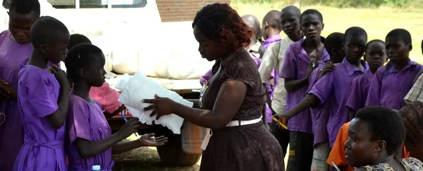201509211228 viola giving out nets to students