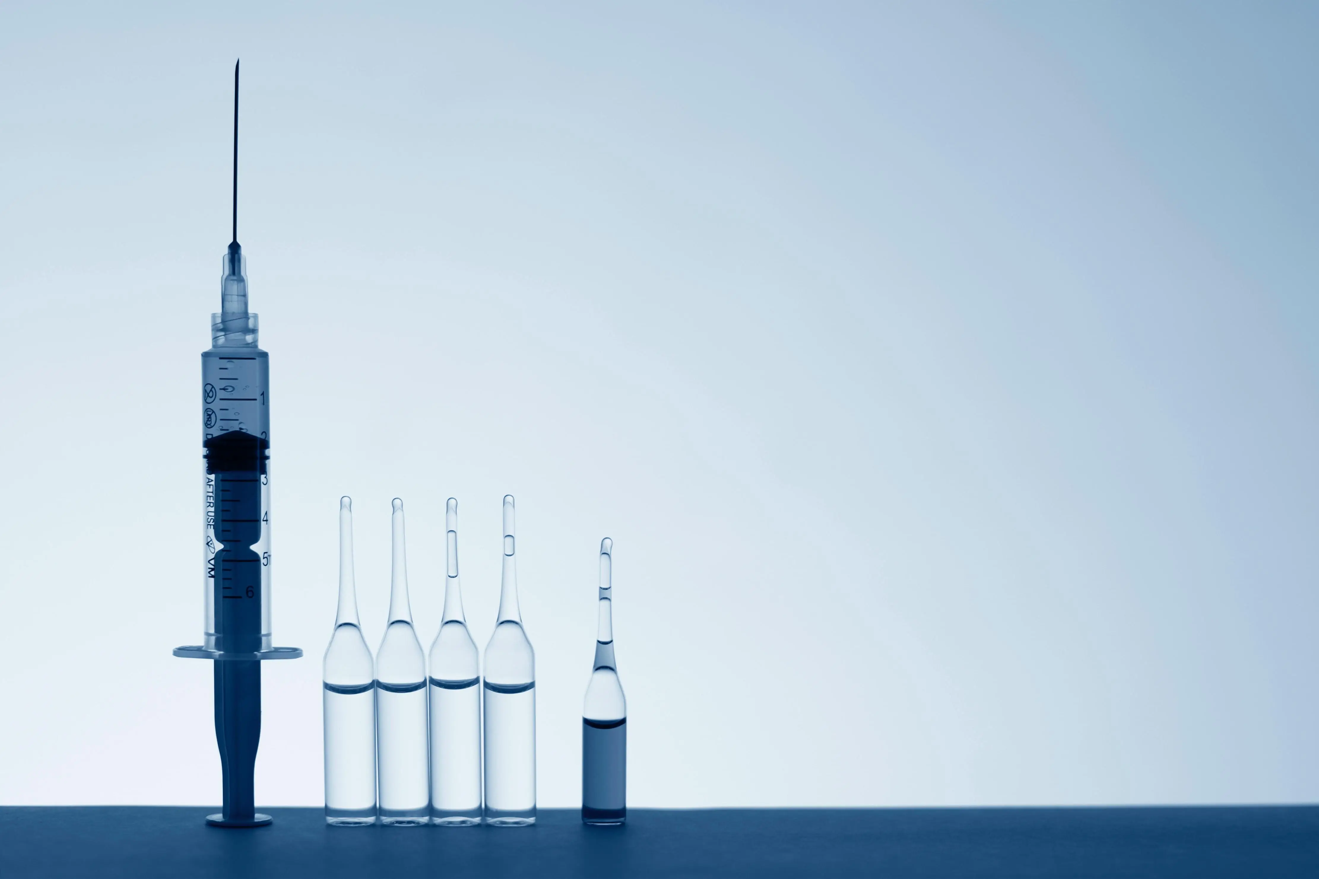 Needle and vials of medication