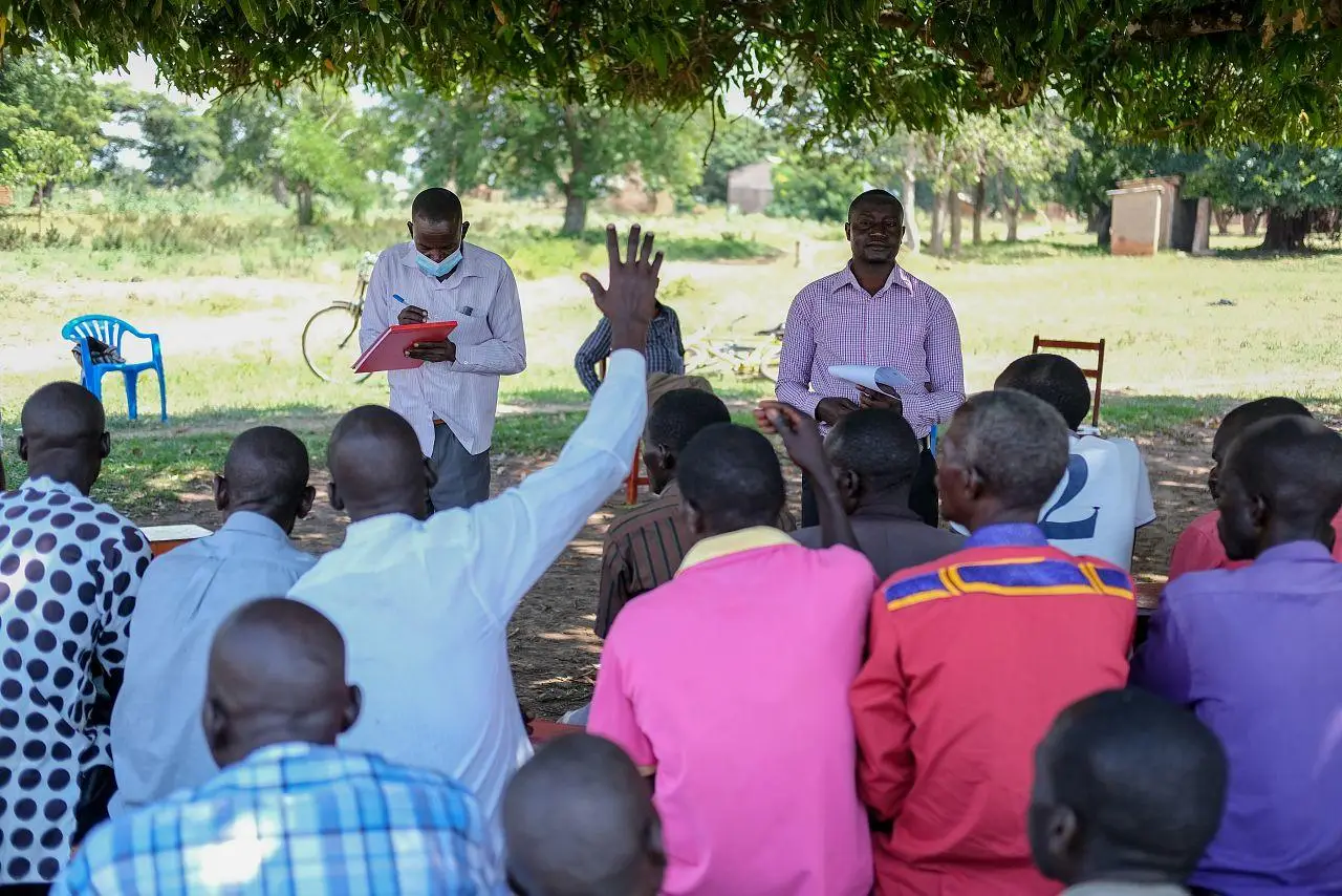 Review meeting with village health teams at community level in Uganda