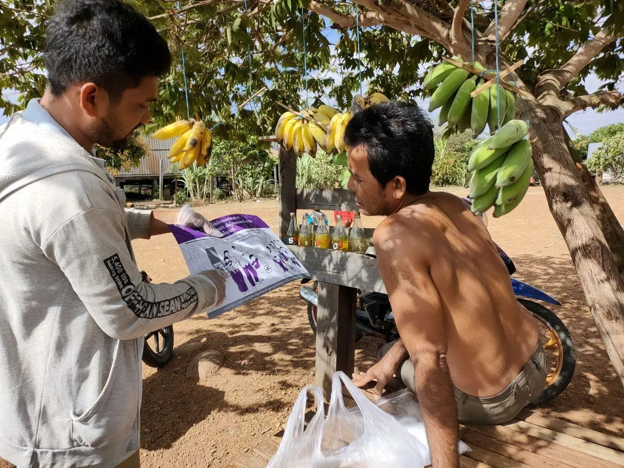 A village malaria worker explains the correct use of malaria prevention tools, Mondulkiri province, Cambodia