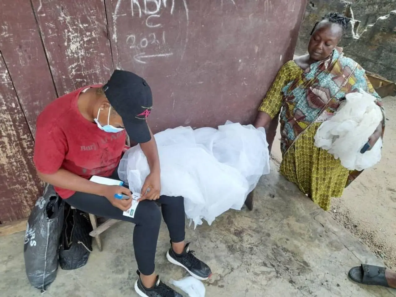 Labelling a mosquito net for durability monitoring study, Ondo state, Nigeria