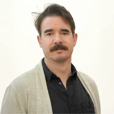Portrait of Tom Heslop, Malaria Consortium's Director of Global Operations Support & Asia