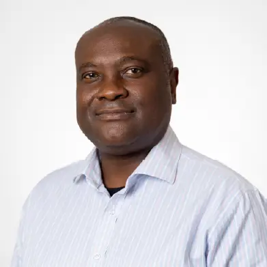 Portrait of Kolawole Maxwell, Malaria Consortium's Programme Director for West & Central Africa
