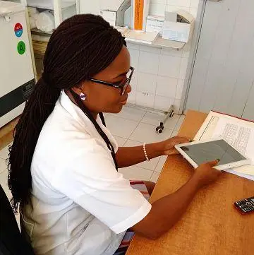 Cacilda performing data collection in Mozambique