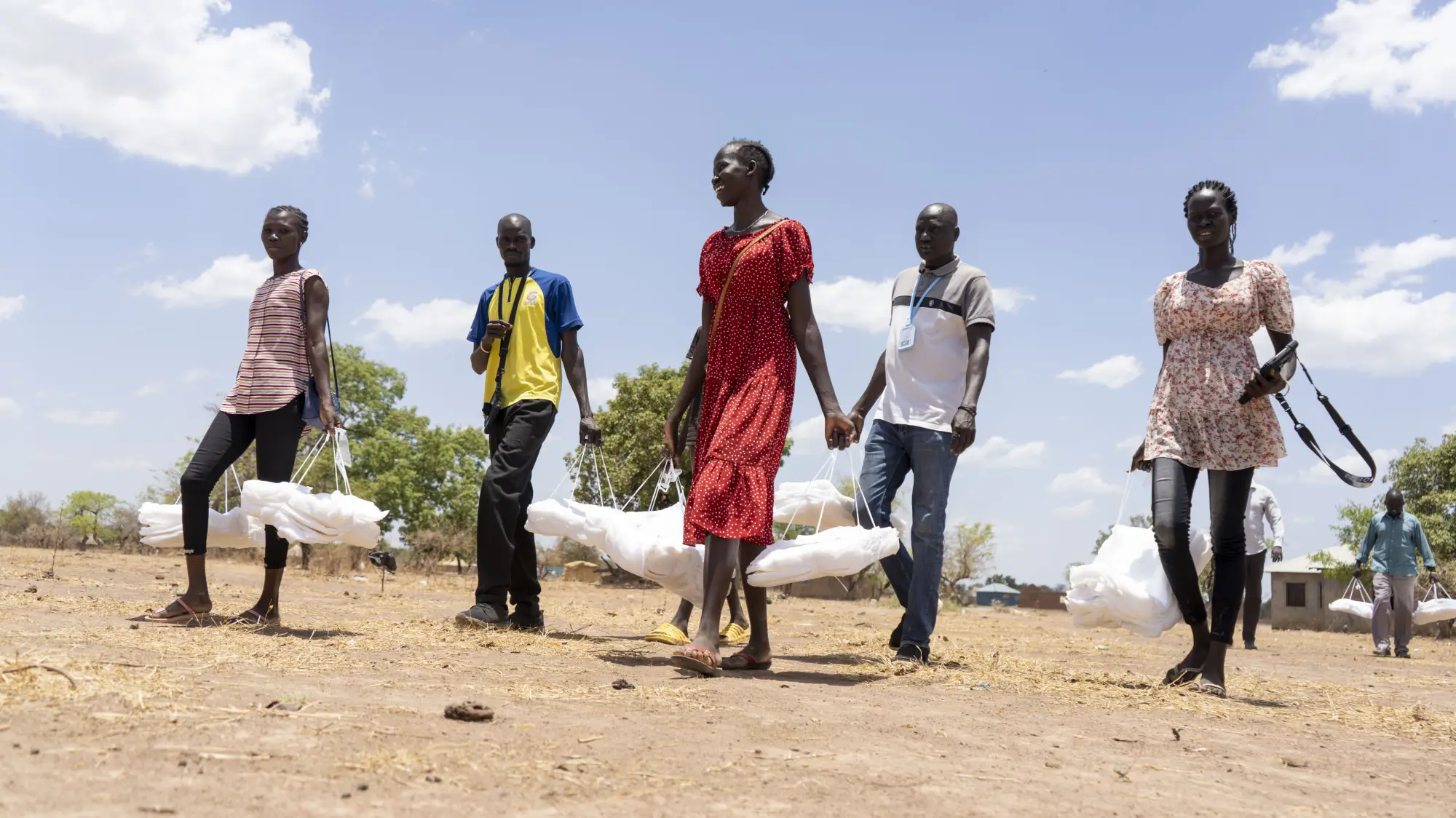 Volunteer registrars distributing nets in Mayom Akoon village in Aweil West from house to house in Aweil West of Northern Bahar EL Gazal State, South Sudan on April 19, 2023.