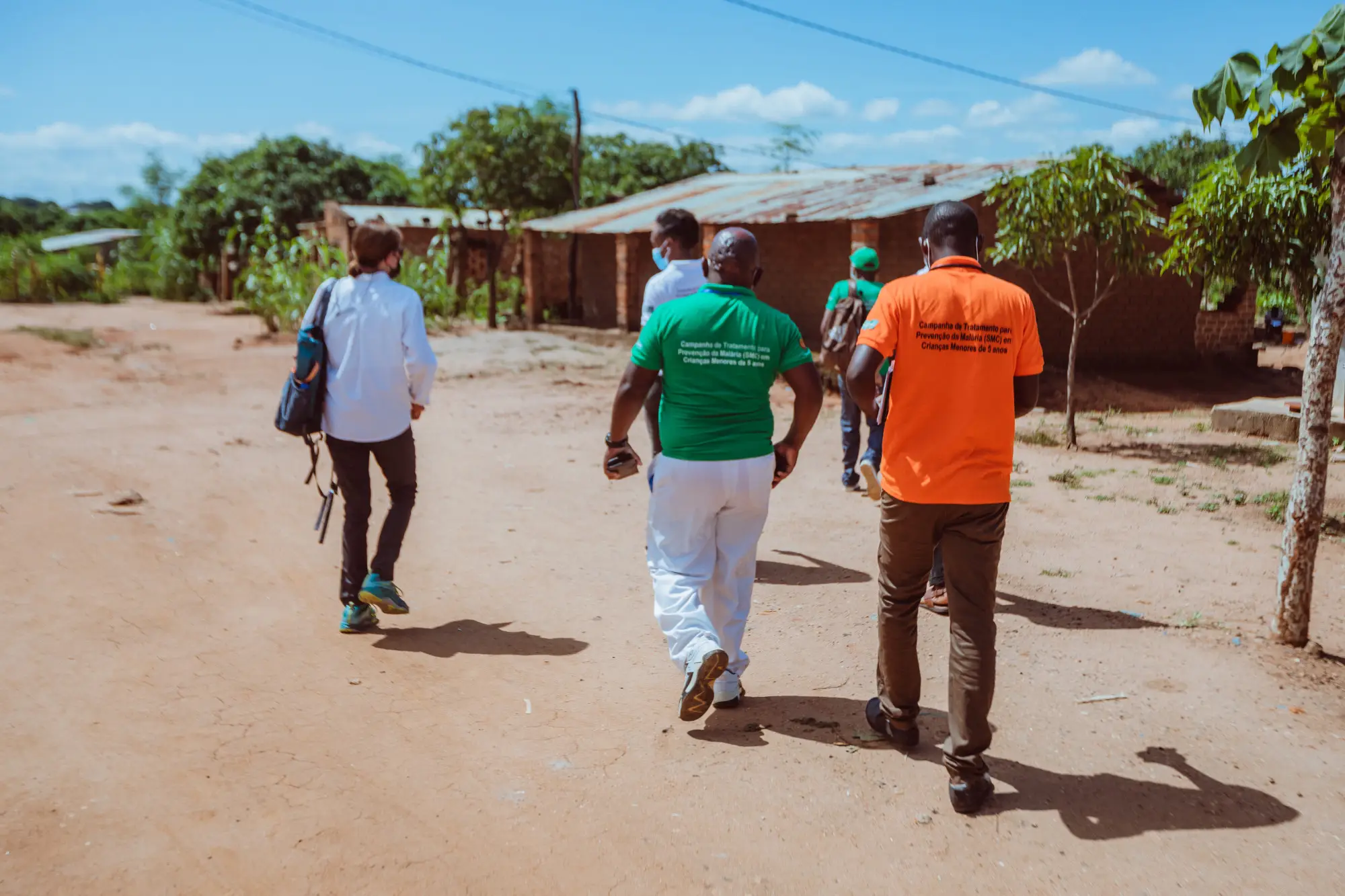 Community workers walking in Malema, Mozambique in 2022