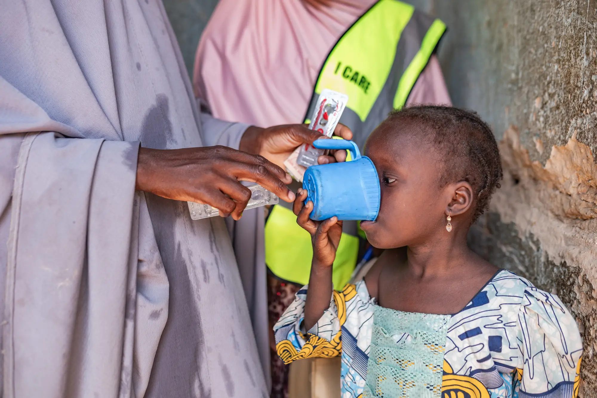 A child receives SMC medication in Kano state, Nigeria in 2023