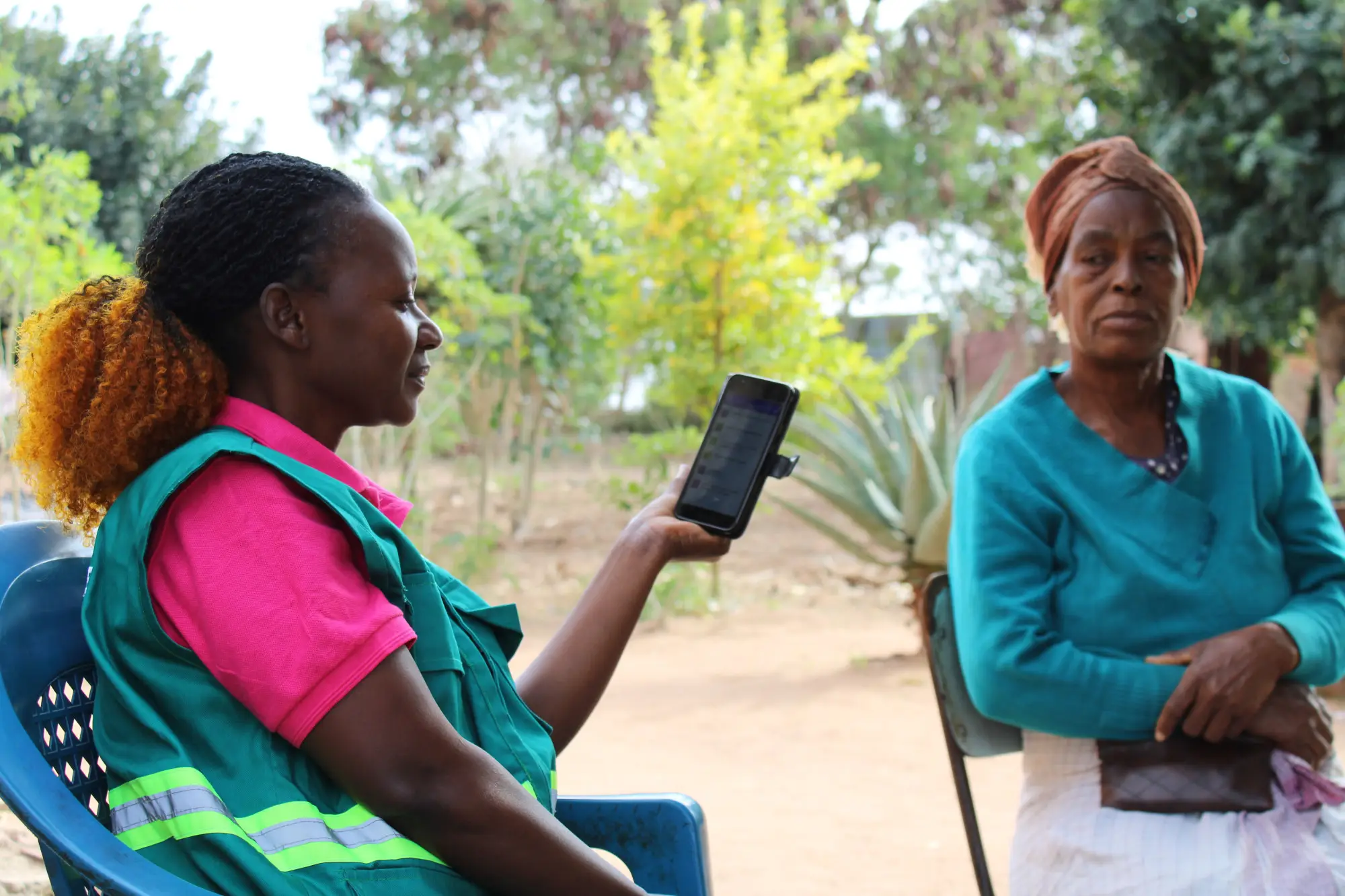 Júlia, a community health worker, attending to a patient in the Umpala community in the Boane district, Maputo Province in Mozambique as part of the upSCALE project