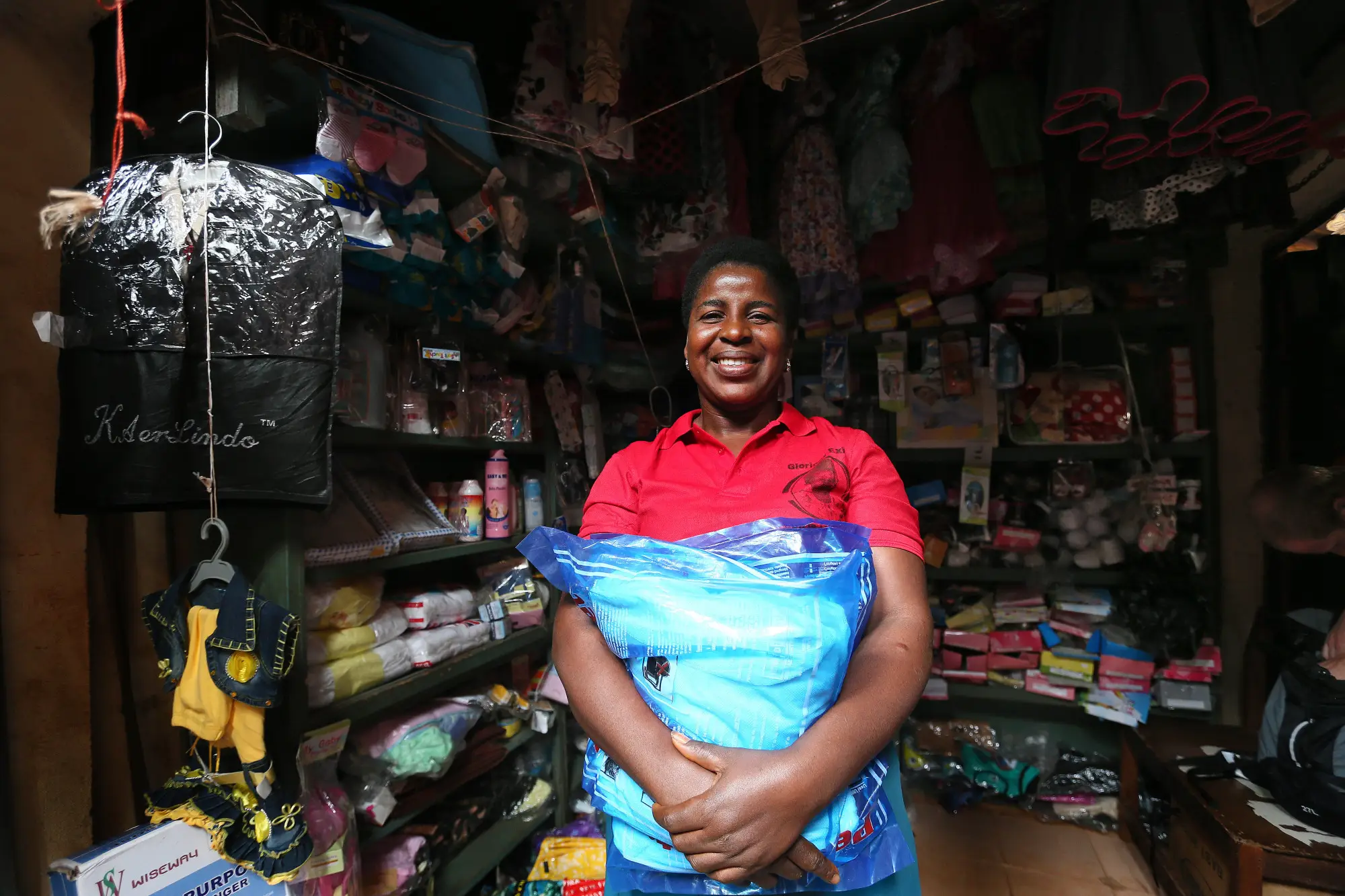 Attau Dorothy sells mosquito nets in Nsukka market, Enugu state, Nigeria