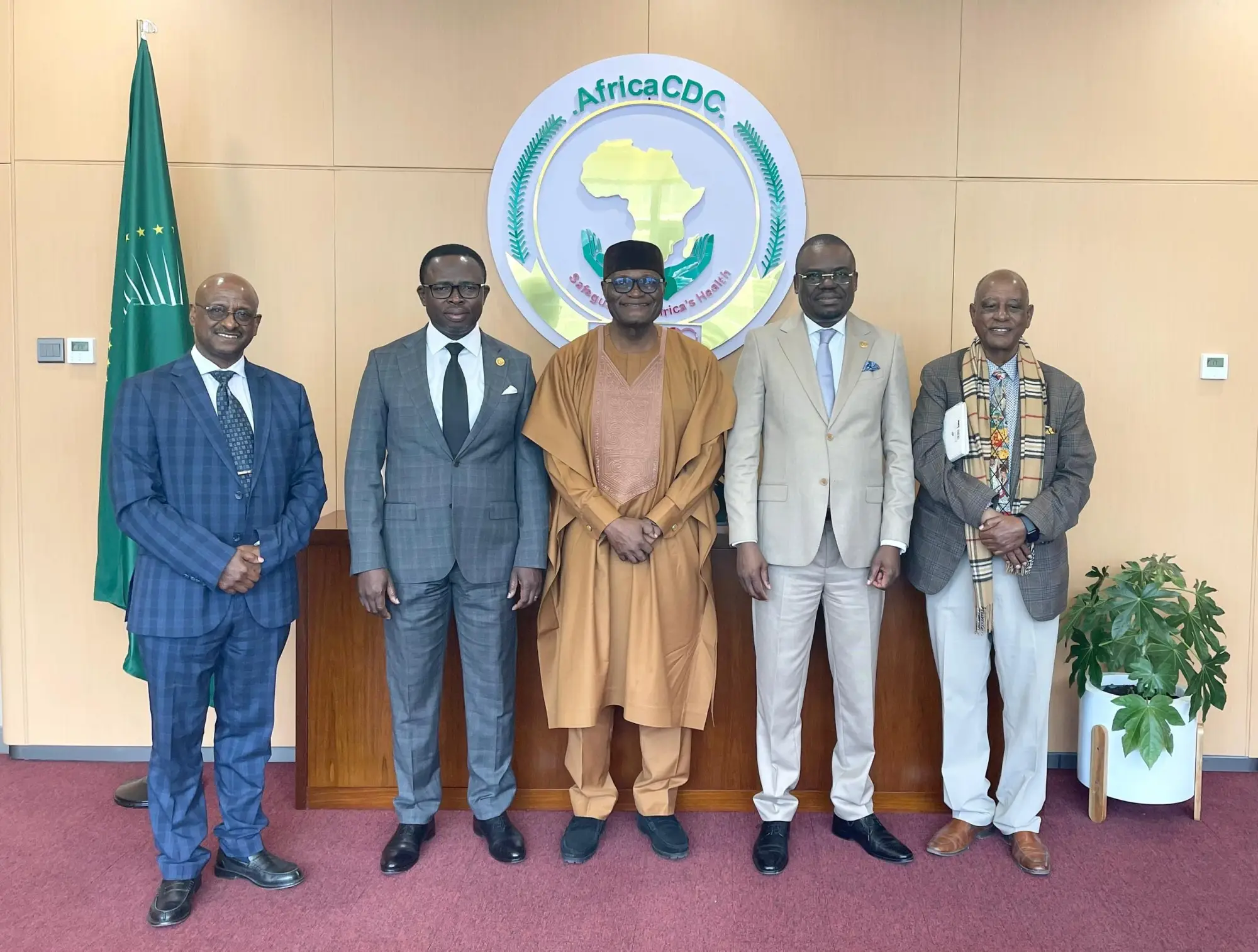 Malaria Consortium staff members with the Director General and Deputy Director General of the Africa CDC
