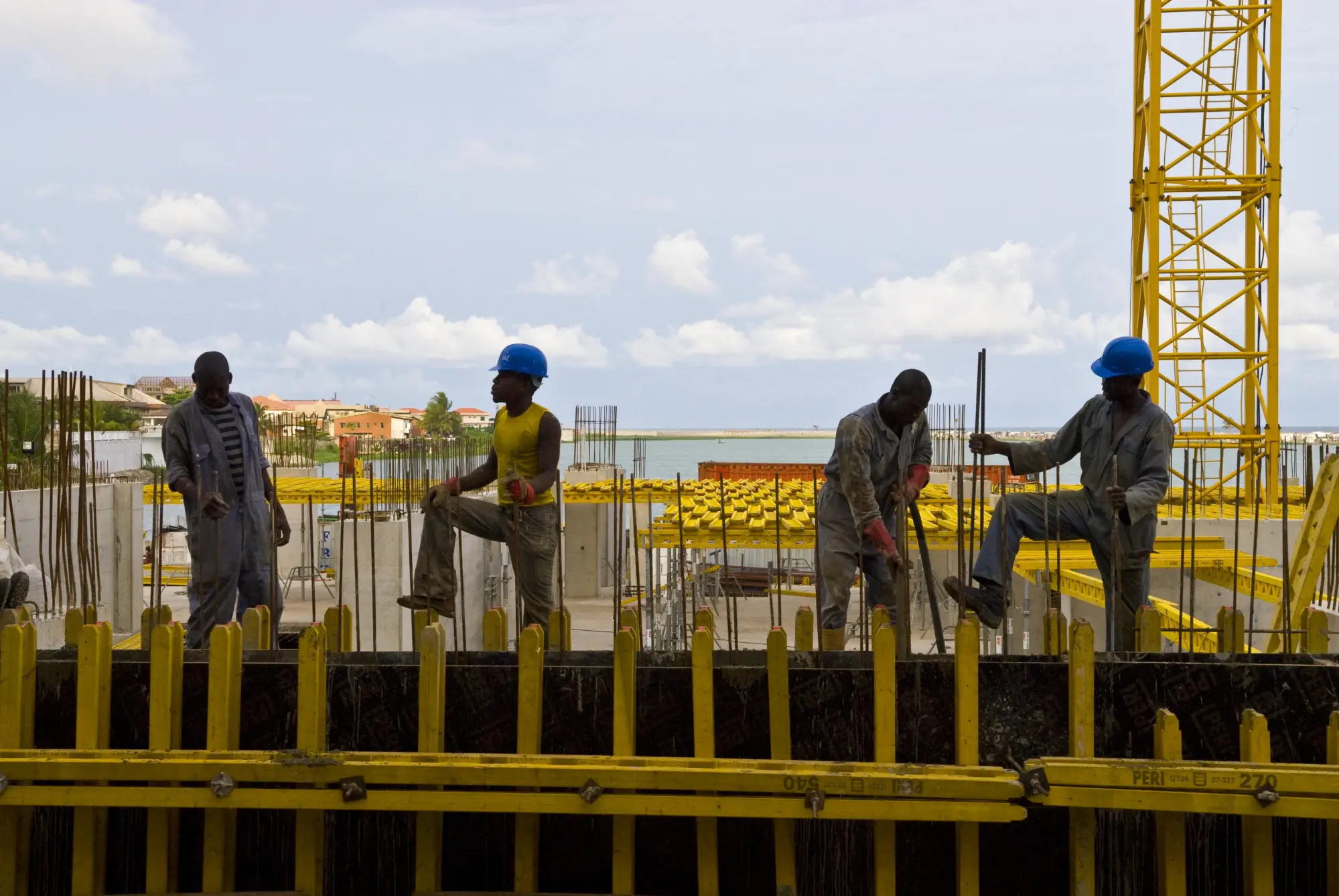 Construction workers on site, Nigeria. Photo: Arne Hoel / World Bank