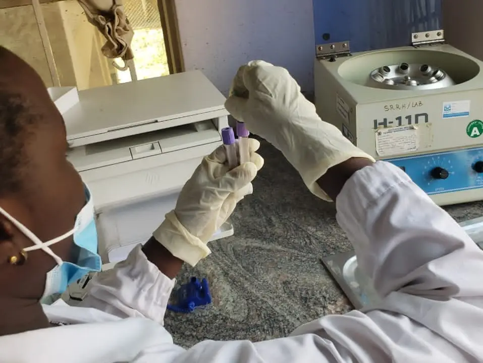 Centrifuging blood samples at Soroti regional referral hospital landscape