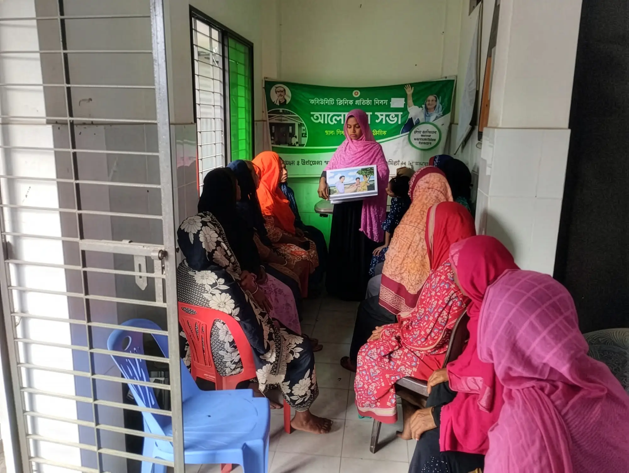 Fatema, a community dialogue facilitator, raises awareness of antimicrobial resistance, Cumilla district, Bangladesh