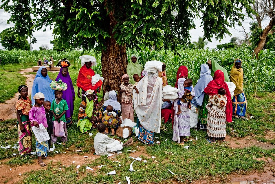 pWomen and children gather under a tree after collecting their LLINs from the distribution point Young children and pregnant women are the most at risk of severe malaria Severe malaria occurs when the infection is complicated by serious organ failures or abnormalities in the patientrsquos blood or metabolism Symptoms of severe malaria can include severe anaemia fever and convulsions problems with breathing extreme weakness circulatory collapse swollen legs blood infection and occasionally kidney failure and coma Even of those who have made it to hospital around one fifth of patients die of severe malariap