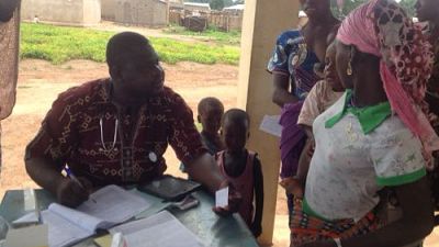 A Community Health Worker discusses the health of the child with her mother