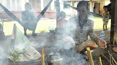 A family visitor cooked on an open fire at Banlung Hospital. It is the only referral hospital in Banlung district. From January to March 2015, around 100 pneumonia cases in children under five years old were diagnosed and treated.Copyright Malaria Consortium/Peter Caton