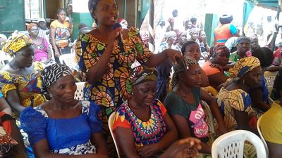 Community members asked questions about malaria prevention and treatment at a World Malaria Day event in Jikwoi, Nigeria.