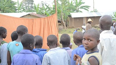 Many children attend these events, and they are encouraged to take notes on how to prevent malaria transmission.