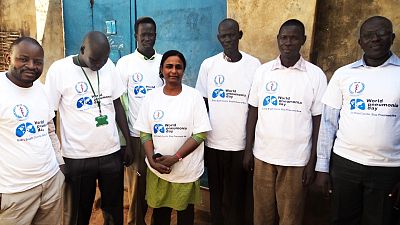 Malaria Consortium staff and one State Ministry of Health staff wearing World Pneumonia Day t-shirts. From left to right: John Mubonderi (MC Field Coordinator), Alexander Modi (Logistics Officer), Prasad Kalyani (MC BCC Specialist), behind Kalyani is Deng Kuot (Communications Officer-State MoH-NBEG), Paulino Deng (Logistics Assist), Dr.Dricile Ratib (iCCM/nutrition project coordinator), Lobson Kajawuya (Health Communications Officer)